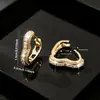 Venta Caliente Transfronteriza Moda Commute Temperamento Aretes Amazon Cobre Incrustado Circonita Lujo Ligero Forma de Corazón Hueco Alto Gama Sensación Aretes
