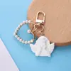 Chaveiro de Pérola Criativo Pérola Oca Placa de Liga de Amor Capa Protetora para AirPods Estojo de Ouvido Pingente