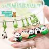 Llavero de Panda Colgante Mini de Resina Creativo Pequeño Regalo para Estudiantes de Primaria Decoración de Mochila Venta al por Mayor Merchandising para Fans del Primero de Mayo