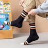 Calcetines largos para hombre otoño e invierno ins de moda a rayas calcetines deportivos calcetines para mujer calcetines de baloncesto de altura media Zhuji comercio exterior transfronterizo
