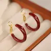 Acessórios de Orelha em Alta no Tiktok Estilo Ano Novo Brincos Vermelhos Personalizados Brincos da Moda Versáteis Tachos de Orelha Ganchos de Orelha Presilhas de Orelha para Mulheres