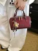 Bolso Boston versátil de nicho de lujo ligero para mujer, nuevo modelo 2026, bolso de mano de alta gama, bolso cruzado, adecuado para el trabajo y los desplazamientos, bolso de hombro