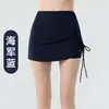Falda pantalón de tenis de alta elasticidad de dos piezas simuladas para mujer, falda corta casual deportiva para correr anti-exposición, pantalón de media falda para yoga