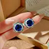 Moda Europea y Americana Colgante de Paraíba de Gran Quilate Pendientes de Diamante Champagne Anillo Azul Real Juego de Gemas para Mujer