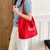 Bolso de hombro de gamuza nicho nuevo bordado para el día a día, bolso de mano de gamuza para mujer moda, simple invierno 2026 gran capacidad
