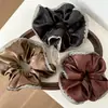 Goma para el pelo scrunchie de jacquard de cuero sintético minimalista estilo coreano con diseño único y ribete de encaje, Elegante accesorio para coleta