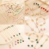 Joyería de flor de la suerte de gran venta transfronteriza europea y americana, traje de trébol de cinco hojas, pulsera, pendientes, collar, anillo, joyería para mujer