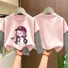 Camiseta de manga larga a rayas de algodón puro para niñas, estilo primavera y otoño, imitación de dos piezas, top de dibujos animados estiloso para niños mayores