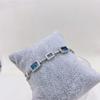 Plata S925 chapada en platino con incrustaciones (Topacio azul Londres) pulsera