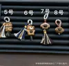 Bodhi Xingyue con Accesorios de Madera de Durazno, Juguete Pequeño de Goteo, Accesorio de Mano Desmontable con Asa de Oso/Pulsera