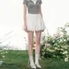 Moda gestante para o verão de 2026, nova saia curta de bolinhas, saia tulipa, saia fofa, saia midi evasê estilo doce em off-white