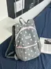Mochila ligera para la escuela y los viajes, mochila elegante para estudiantes, mochila linda de lunares, mochila casual y versátil para estudiantes