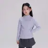 Rollos grandes y pequeños otoño e invierno 2026 nuevo estilo para niños suéter con cuello de encaje medio alto para niñas top interior suave antipilling para niños