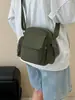 Mochila pequeña casual transfronteriza 2025 nueva popular ligera bolsa para teléfono móvil nailon hombro bandolera comercio exterior