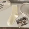 Calcetines de lunares con borde de volantes para mujer, calcetines blancos de primavera y otoño, calcetines de algodón puro hasta la mitad de la pantorrilla, calcetines de estilo japonés para estudiantes con lunares, calcetines holgados de moda ins de primavera y otoño