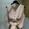 Chaleco de punto fino sin mangas con escote en V hueco estilo Chanel para mujer, nuevo modelo de verano 2026, impresionante top exterior