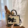Bolsa Feminina de Designer de Nicho Mais Vendida na Primavera, Nova Moda Bolsa Transversal de Alto Padrão, Bolsa de Mão para o Trabalho, Bolsa Quadrada Pequena