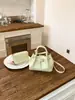 Bolsa de Mão Super Popular Estilo Coreano Feminina 2026 Nova Versátil Casual Bolsa de Ombro Nicho Versátil Bolsa Transversal Saco
