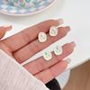 Nuevo Pendiente de Plata con Forma de Tulipan Suave Juego de Tres Piezas Fresco Nicho Joyería de Oreja de Mariposa Simple para Niñas para Mujeres