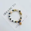Pulsera de Cerámica Jingdezhen Nueva Historieta China Pulsera Boutique Venta al por Mayor Estudiante Joker Explosiones Puesto del Mercado Nocturno Pulsera