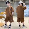 Trajes Deportivos y de Ocio de Moda para Niños Verano 2025, Conjunto de Dos Piezas de Camiseta Holgada Lisa de Manga Corta y Pantalón Tres Cuartos Suelto para Niños Medianos y Grandes