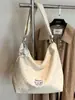 Bolsa de Lona con Lunares Simple Estilo Coreano de Gran Capacidad 2026 Transfronteriza, Bolso Cruzado de Hombro Único, Bolso Tote de Nicho para Viajes Diarios