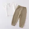 Traje de verano de algodón y lino de manga corta para niños y niñas, delgado, color liso, gasa de algodón, leggings, conjunto holgado de dos piezas, venta al por mayor