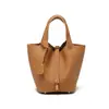 Bolsos de alta gama cuidadosamente seleccionados para mujeres que van al trabajo, bolsos tipo cubo, bolsos tipo cesta de piel de vaca de capa superior genuina para mujeres