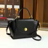 Bolso de mano único con bloques de color para mujer, nuevo bolso vintage de otoño e invierno con cierre de broche, ala de lujo ligero, bolso de hombro y cruzado