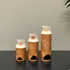 Garrafa a vácuo de pequena capacidade de 15ml, 30ml, 50ml feita de material PP, material de embalagem para cuidados com a pele com mola plástica, personalizável e processável