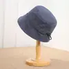 Sombrero Cubo Casual de Tela Ajustable Estilo Nuevo Japonés Sombrero Cubeta Sombrero para Adulto de Mujer Resistente al Viento Protección Solar Versátil Sombrero de Pescador