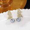 Pendientes de perlas de alta gama, sencillos, ligeros y de lujo, de estilo coreano con aguja plateada y diseño de nicho, con alas asimétricas y diamantes.