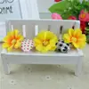 Flor artificial flor de seda cabeza de flor de tela tamaño pequeño crisantemo girasol cabeza de flor girasol flor bolsita muñeca accesorios de flor