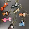 Llavero Colgante Muñeco Animal Dibujo Animado Ojos Grandes Jirafa Rey León Llavero para Bolso Pequeño Regalo Temático Mayoreo
