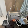 Bolso Clásico para Mujer 2025 Nueva Moda Portátil Textura Cerradura Bolso Cuadrado Pequeño Portátil Bolso de Hombro de Gama Alta Bolso Cruzado