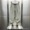 Verão 2025 Novo Algodão e Linho Ultrafino Respirável Caimento Calças Casuais Masculinas Tendência Soltas Pregueadas Harem Cenoura