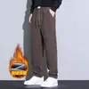 Atacado do fabricante calças casuais de veludo plus outono e inverno estilo coreano masculino moderno novo barato versátil soltas plus size perna reta