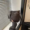 Bolso Cubo de Gama Alta Estilo Retro Casual para Mujer 2026 Nueva Moda Versátil de Hombro Único para Viajes Cotidianos Cruzado Simple Alta Apariencia