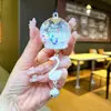 Botella de arena movediza creativa DIY Campana de viento aceite luminoso flotante llavero bolsa Colgante de coche pequeño regalo fabricante