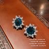 Pendientes de flor de aguamarina brillante chapados en oro de 18 quilates Pendientes de copo de nieve de circonita y aguamarina multifacética Pulsera Love