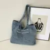 Bolsa de Mezclilla Casual de Gran Capacidad Shuai Mijia para Mujer 2026 Nuevo Bolso de Hombro para el Trabajo Ligero Bolso Tote para Estudiante Universitario