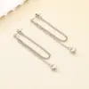 Pendientes de Corazón Chapados en Oro de 18 Quilates, Modernos y de Alta Gama, Comercio Transfronterizo, Estilo Lujo Ligero, Pendientes Largos de Corazón de Acero Inoxidable