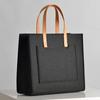 Nueva y moderna bolsa de fieltro sencilla y creativa, combinable con todo, de gran capacidad y de color liso.