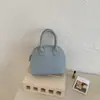 Bolso de Mano de Alta Gama con Patrón de Lichi para Mujer 2025 Nuevo Versátil Color Sólido Elegante Bolso tipo Concha para Hombro Cruzado