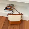 Otoño 2026 Nuevo Bolso de Moda de Gama Alta de Nicho Cremallera para Viajes Diarios Bolso Cruzado Tipo Cubo Bolso para Teléfono Bolso de Mujer al por Mayor