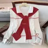 Suéter de punto con bloques de color estilo europeo y americano con cuello chal, diseñado para mujeres, perfecto para otoño e invierno, corte ajustado y se puede usar como capa interior o prenda superior.