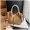 Bolso de Mano de Gama Alta de Nicho Retro Tipo Cubo para Mujer 2026 Nuevo de Moda Versátil Popular Súper Caliente Bolso de Hombro Cruzado