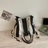Nueva bolsa casual de axila perezosa de Shuai Mi para mujer, bolsa de lona a rayas, bolso de hombro tipo tote con cadena de gran capacidad
