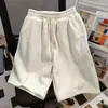 Pantalones cortos deportivos versátiles de hip-hop para mujer, pantalones cortos de color liso con banda elástica de estilo casual americano para hombre, verano 2026