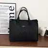 Nova bolsa de maquiagem de malha com flor de névoa estilo coreano, necessaire, bolsa de mão para mulheres, bolsa tote para trabalho e deslocamento